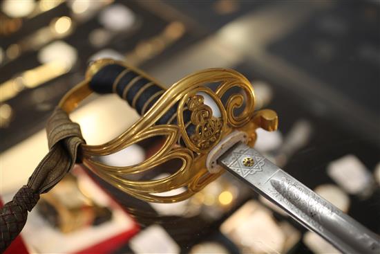 An India General Service group of four medals with dress sword ensuite